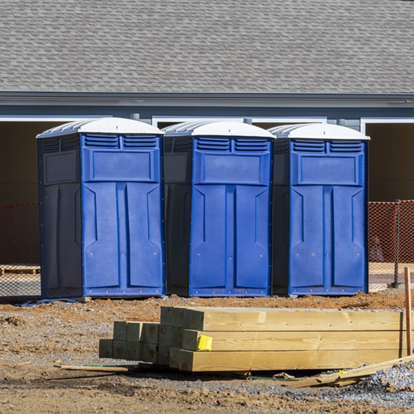 what is the cost difference between standard and deluxe portable toilet rentals in Otway